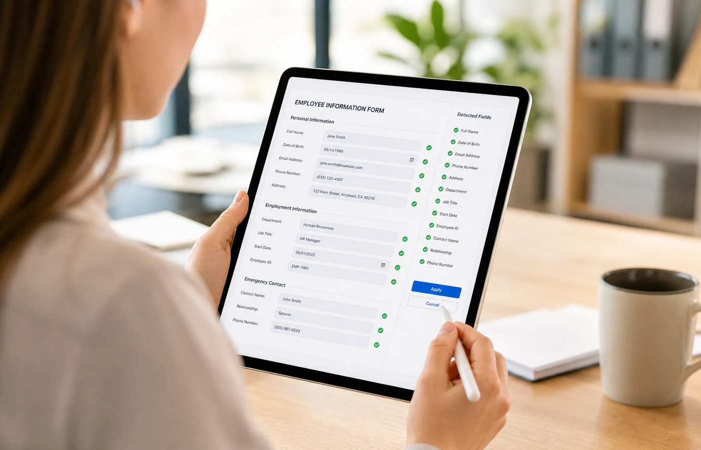 HR manager reviewing an auto-generated fillable PDF on a tablet, with detected fields marked by green checkmarks